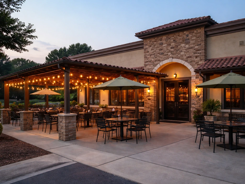 Wide view of an inviting outdoor patio at a Mexican restaurant in Winder, Georgia with seating and warm lighting.