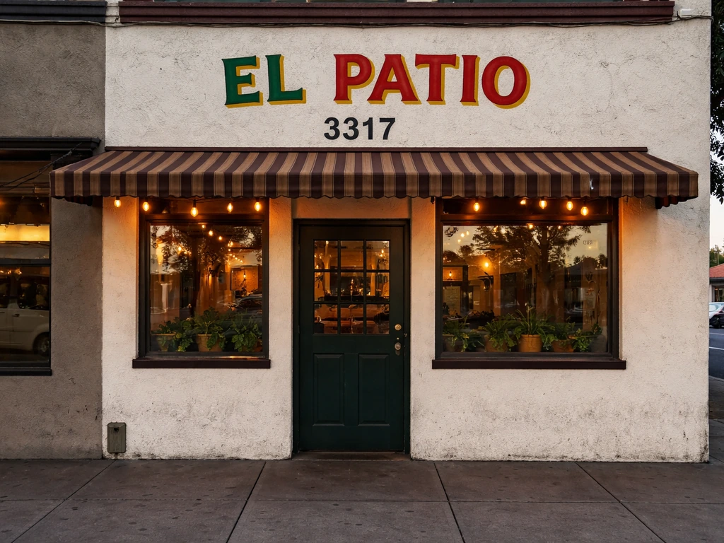 Street-facing view of El Patio storefront exterior with visible location/address on the building.